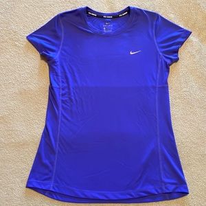 Nike women’s short sleeved running shirt in Size small. Royal blue